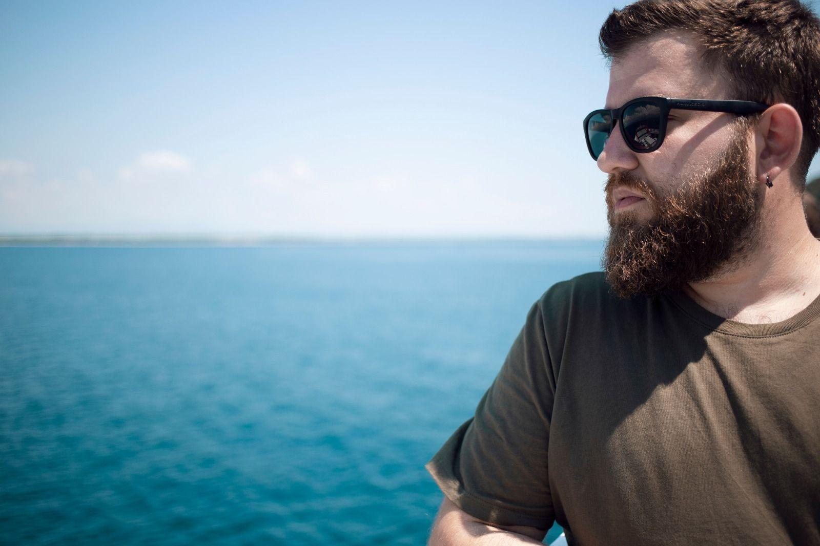 Image of Angelos Arnis with the Greek Aegean archipelago as a background